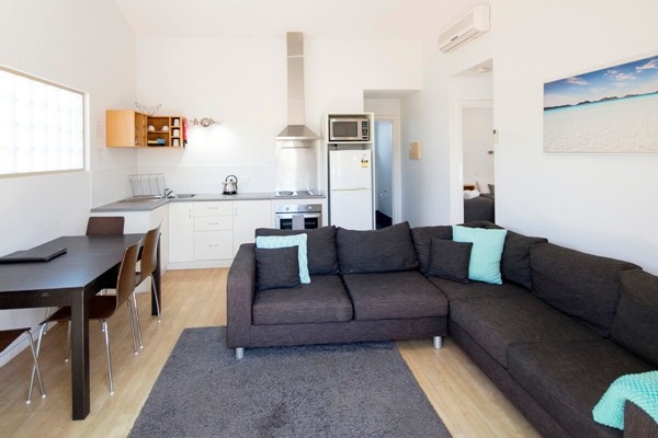 Archipelago Apartments - kitchen apartment with balcony